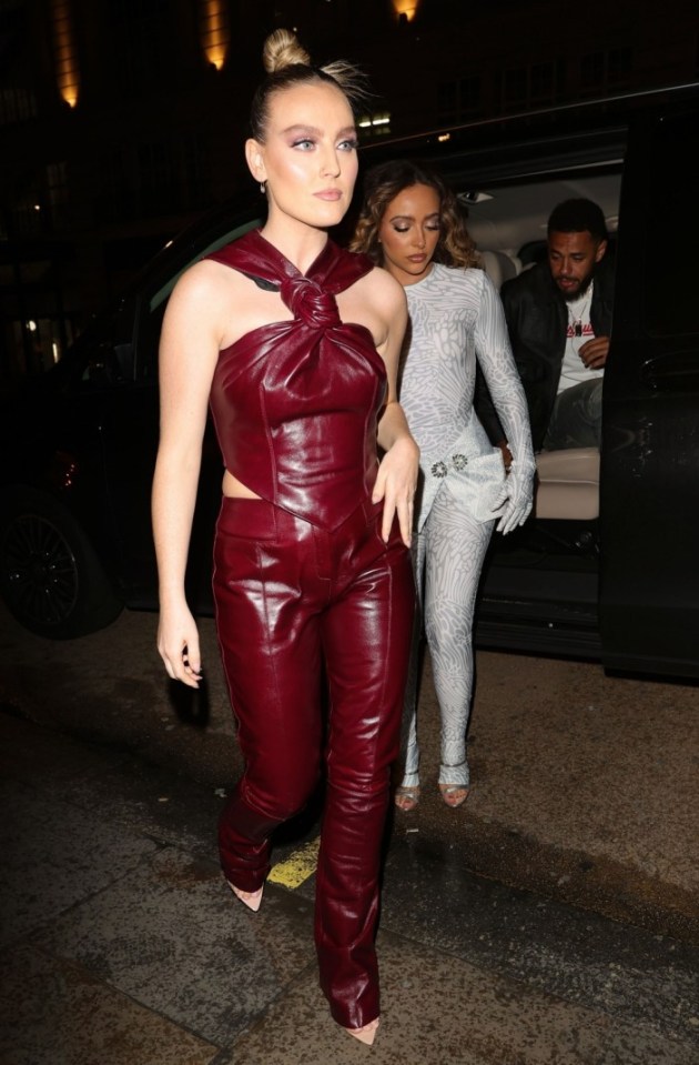 Perrie opted for a pair of red leather trousers and matching top