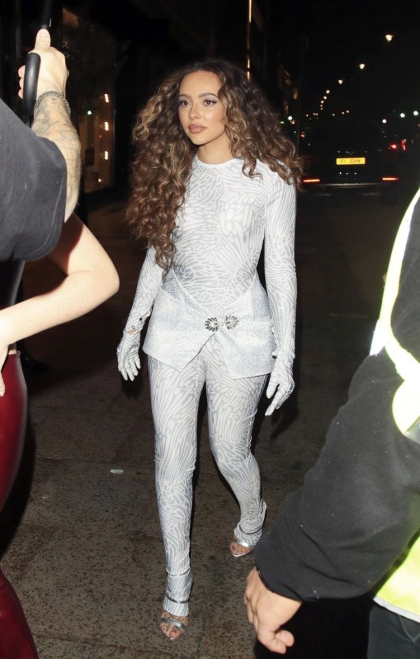 Jade stunned in a silver jumpsuit