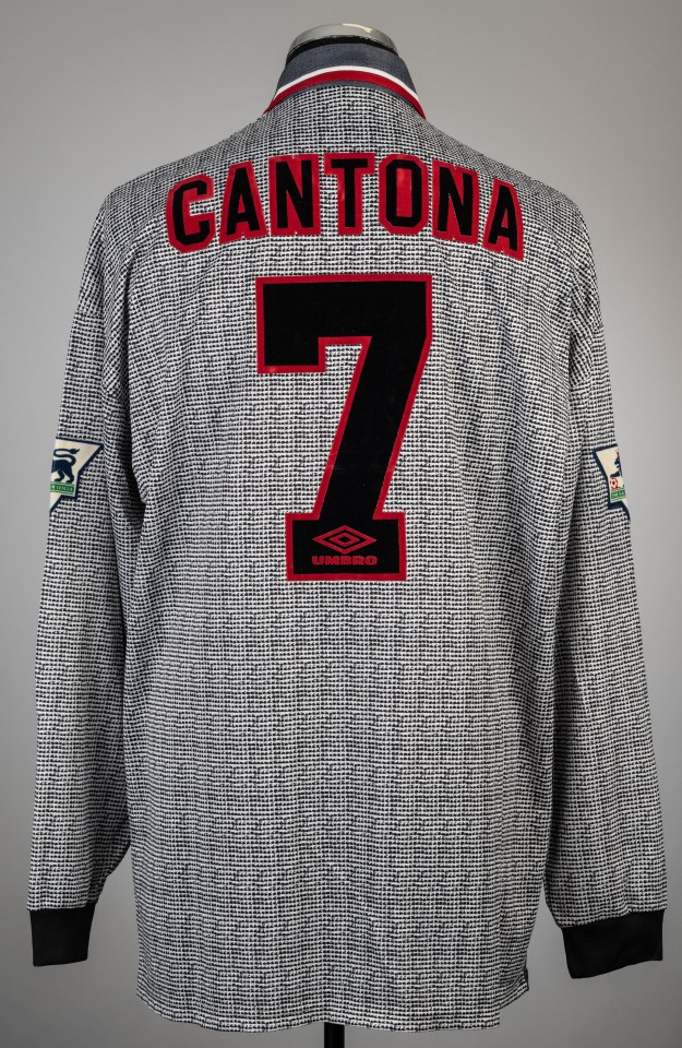 Cantona’s XXL-sized Umbro shirt, with his name and number seven on the back, is to be sold by Graham Budd Auctions in London