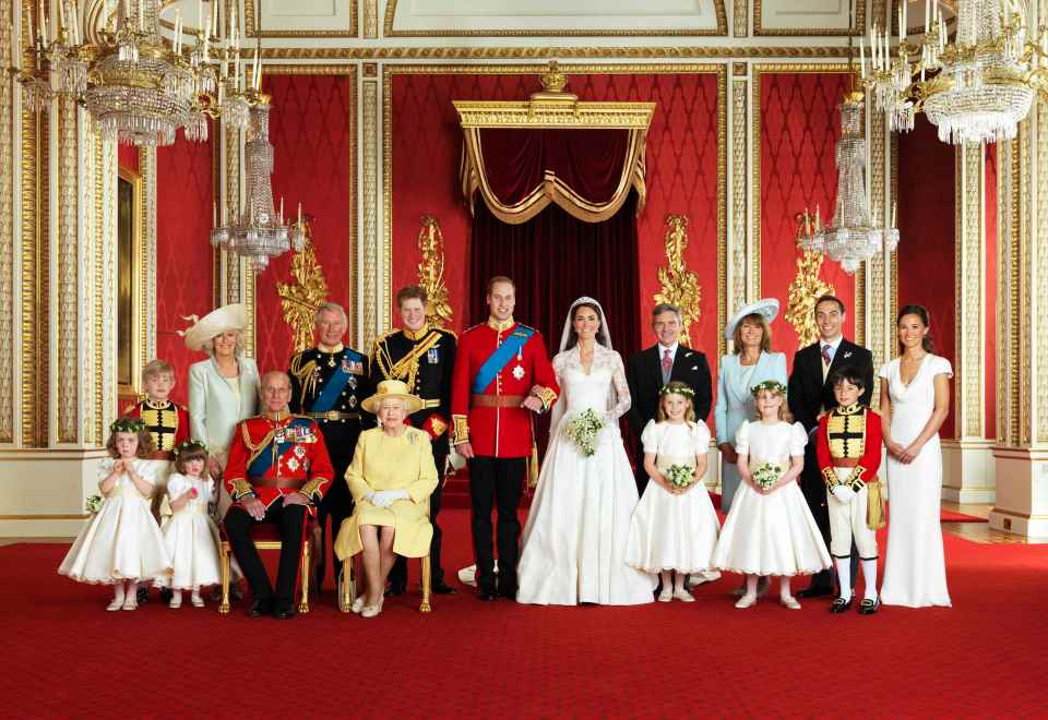 The Queen poses with the Royal Family at William and Kate's wedding in 2011