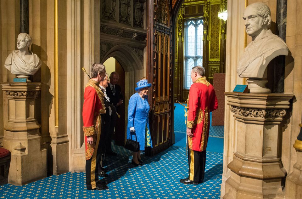 Queen Elizabeth II walks through the traditional Sovereign's entrance and into The Norman Porch.