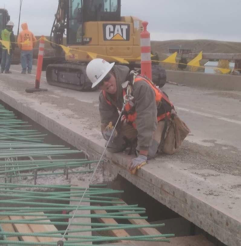 Loren aged 18 on a building site in Montana, US