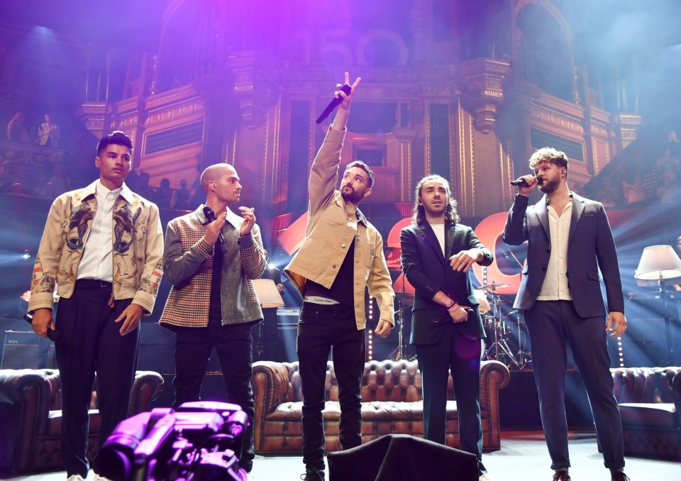 Tom Parker on stage with his The Wanted bandmates