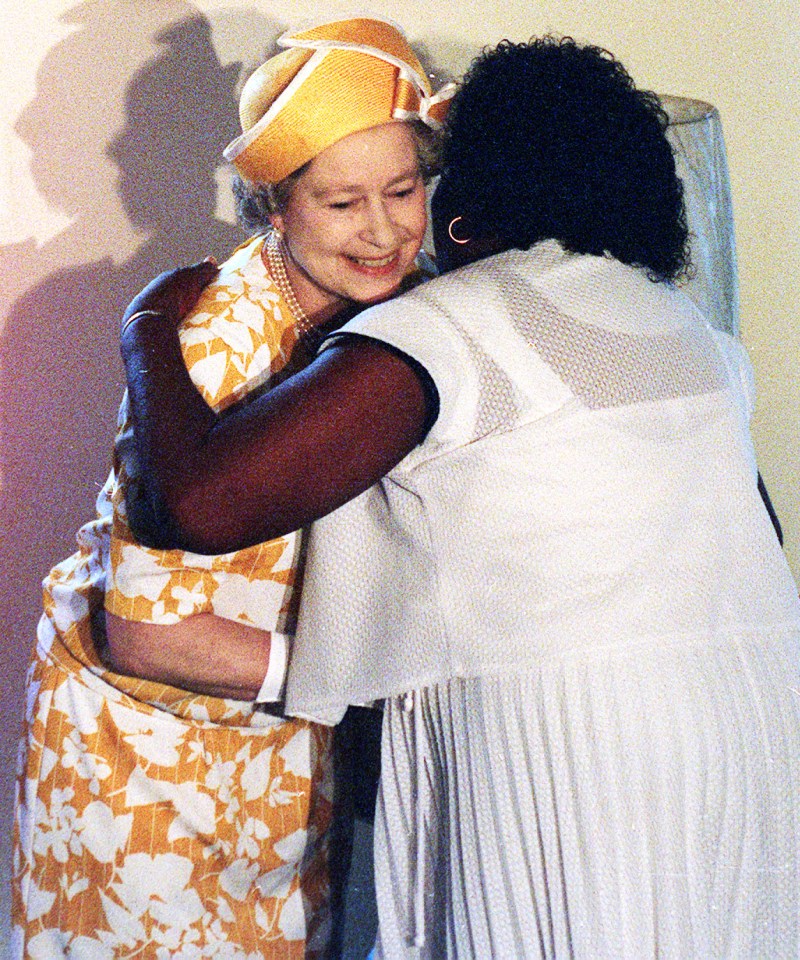 Her Majesty breaks royal protocol and hugged Alice Frazier during a tour of a housing scheme in Washington