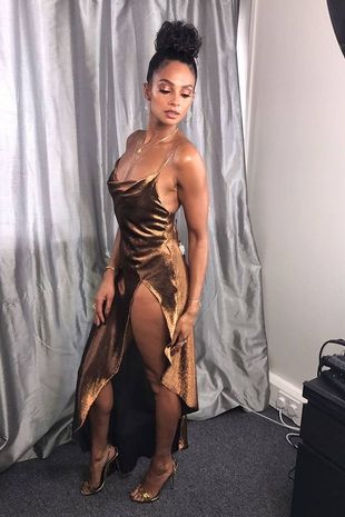 She rocked a bronze dress also worn by Kylie Jenner