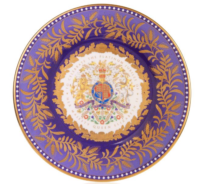 The Royal Coat of Arms is featured in the centre of the side plate