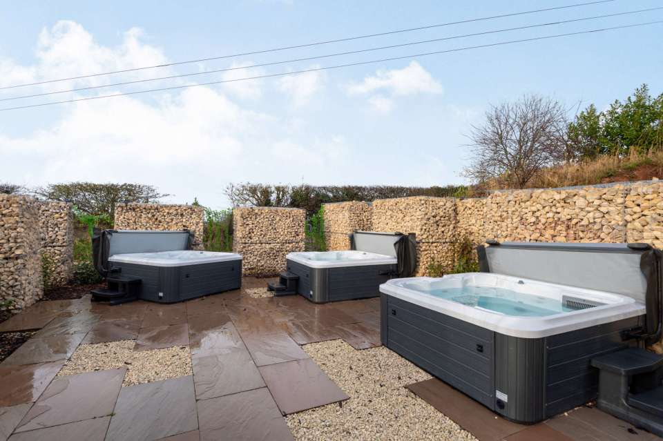 Three hot tubs provide a luxury retreat all year round