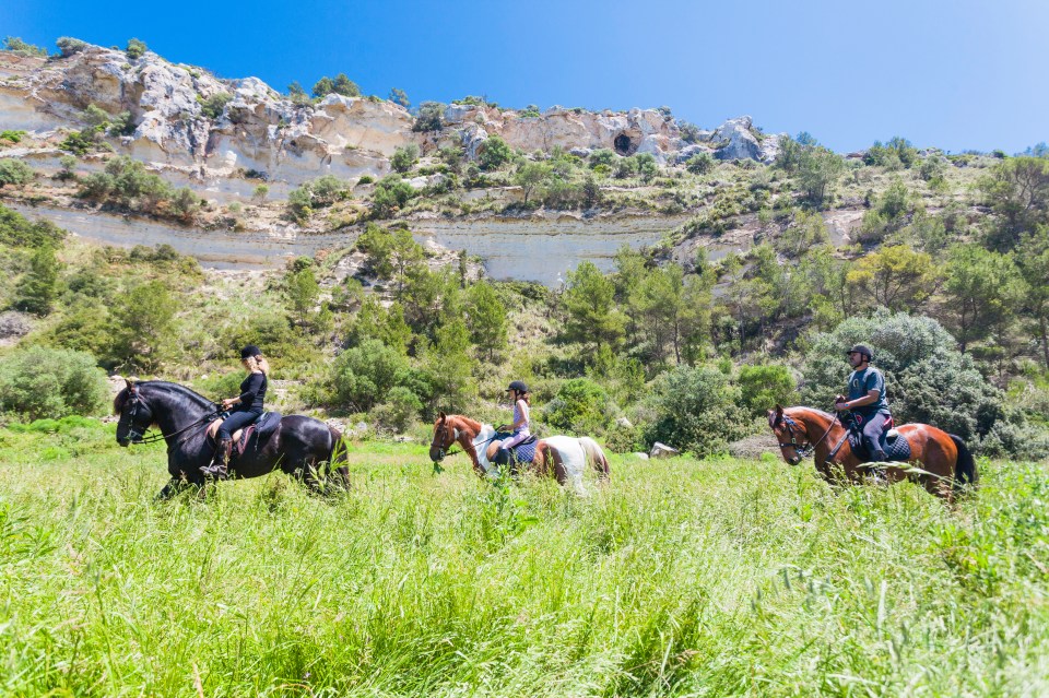 Hike or ride around the island’s Camí de Cavalls 115 mile trail