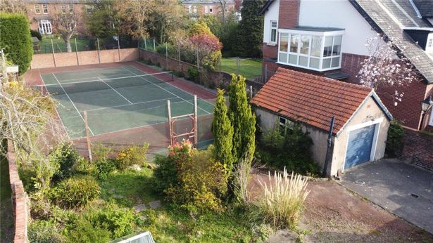 The sale comes with a tennis court