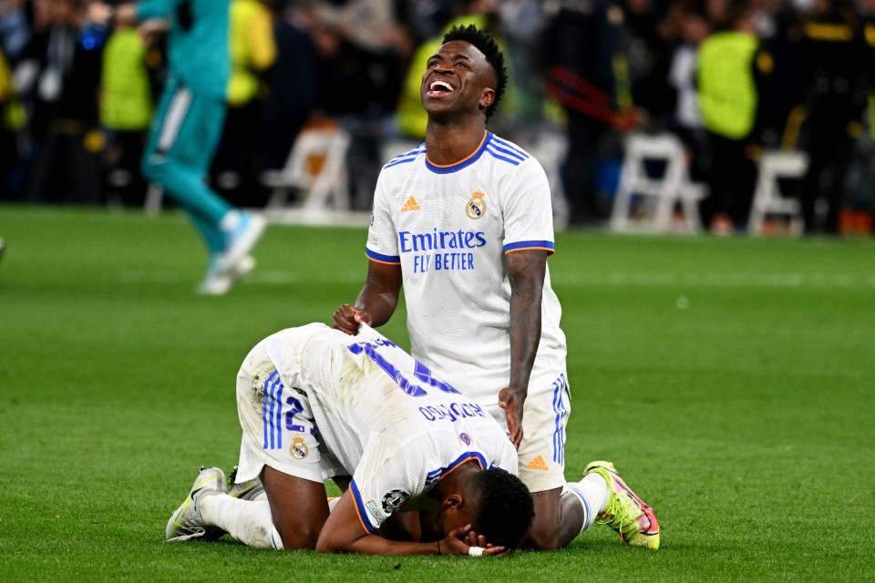 Rodrygo and Real Madrid's Brazilian forward Vinicius Junior collapsed on the pitch