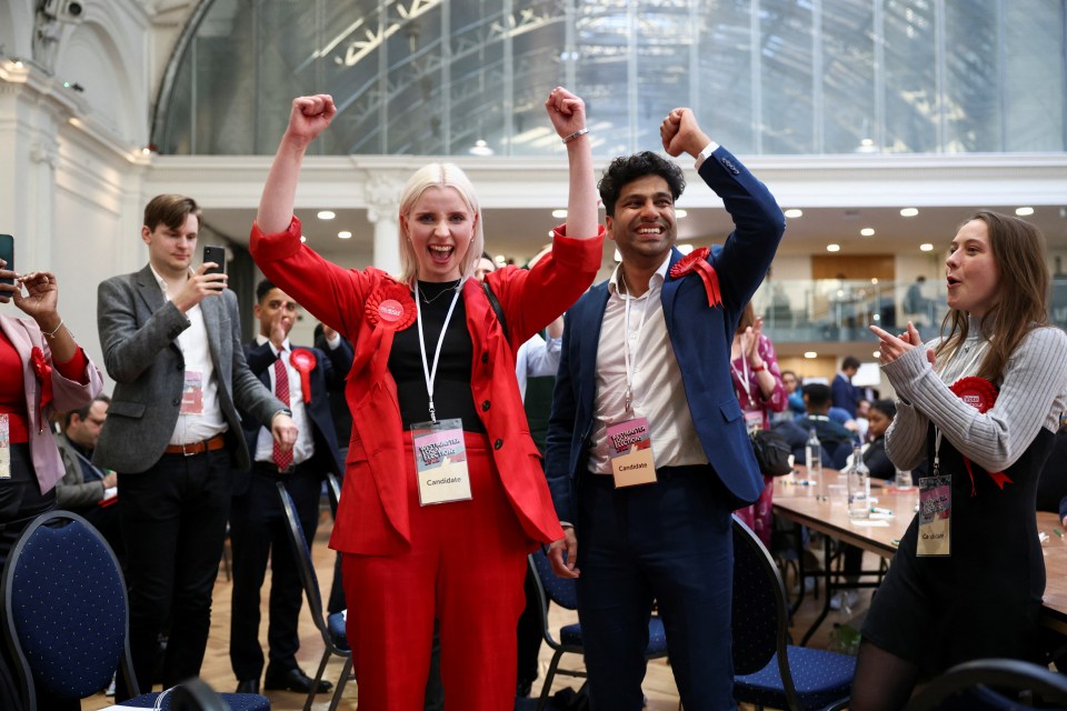 Labour Party candidates and supporters celebrate after gaining Westminster City Council