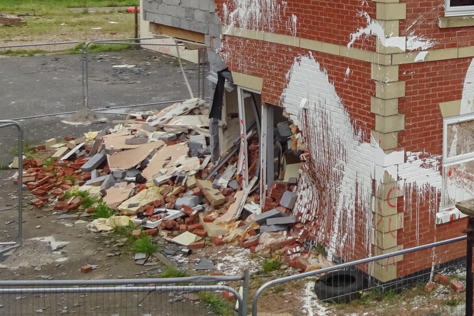 Meanwhile, vandals have torn huge holes in the house and covered it with paint