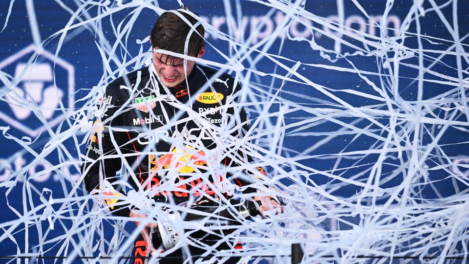 Verstappen was covered with tickertape as he toasted his victory