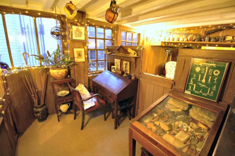 One room is dedicated to the home's seafaring past, with a case of items salvaged from the ocean and a display of knots