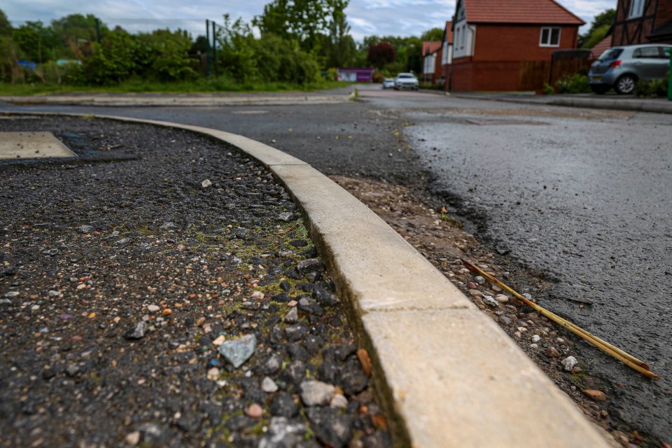 The mum is one of many angry residents who have blasted the developers for not filling in potholes and leaving crumbling roads and pavements