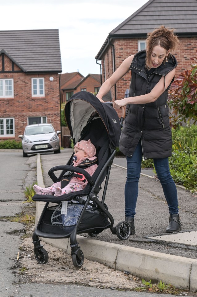 Rachel Hopkins said that her 6-month-old daughter nearly tipped out of her buggy because of the unfinished tarmac