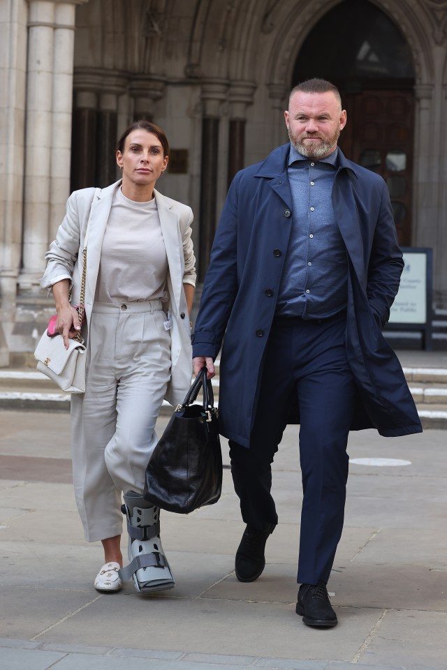 Coleen and Wayne Rooney leaving the Royal Courts of Justice on May 13