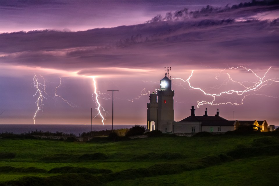 Lightning lit up the landscape over St Catherine's Lighthouse on the Isle of Wight