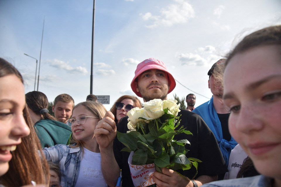 The band were presented with flowers by fans