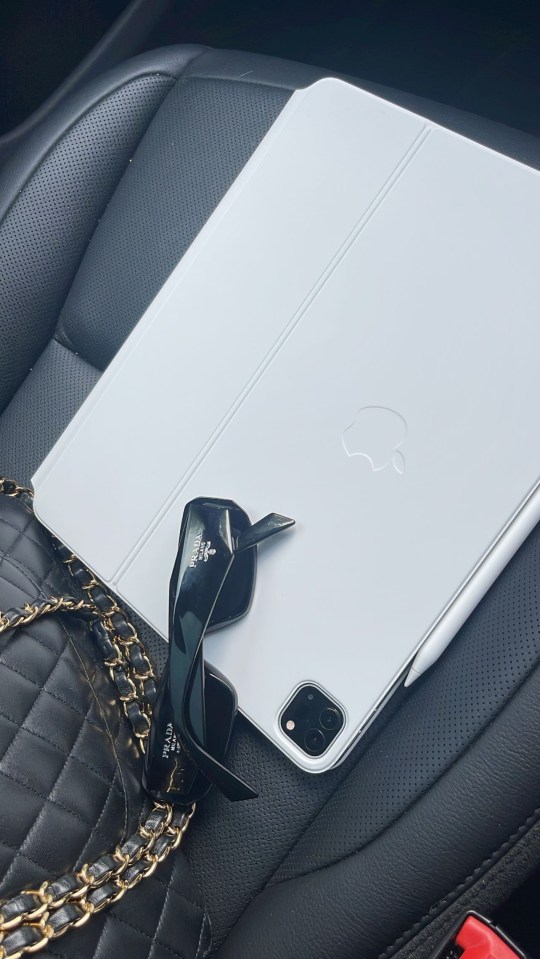 She gave fans a glimpse of her Chanel purse and plush Apple device