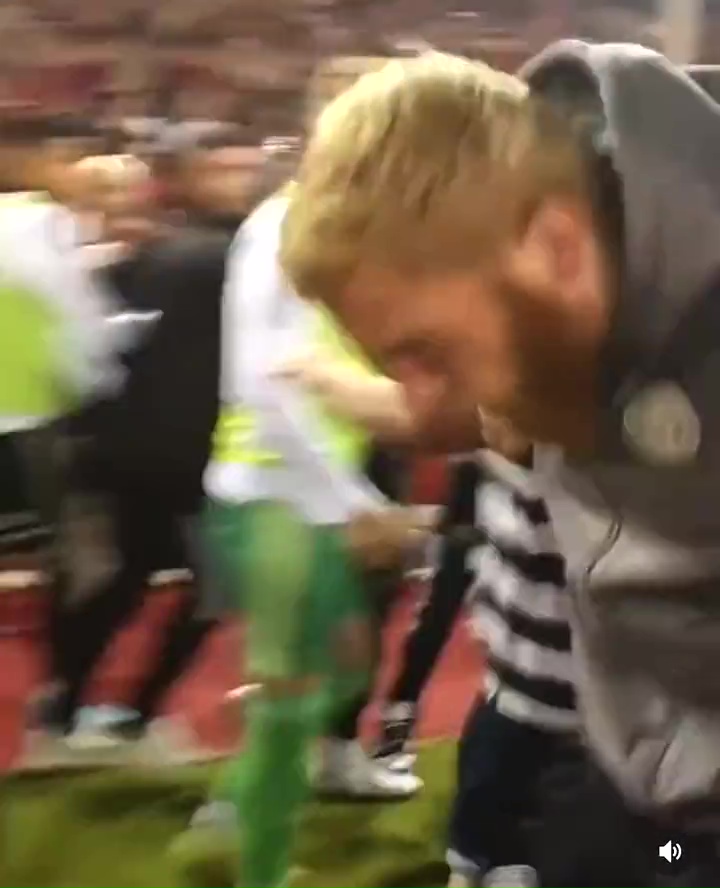 Oli McBurnie appeared to stamp on a fan in the post-match pitch invasion last night