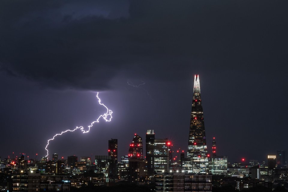 Lightning strikes in London with the Shard in the foreground