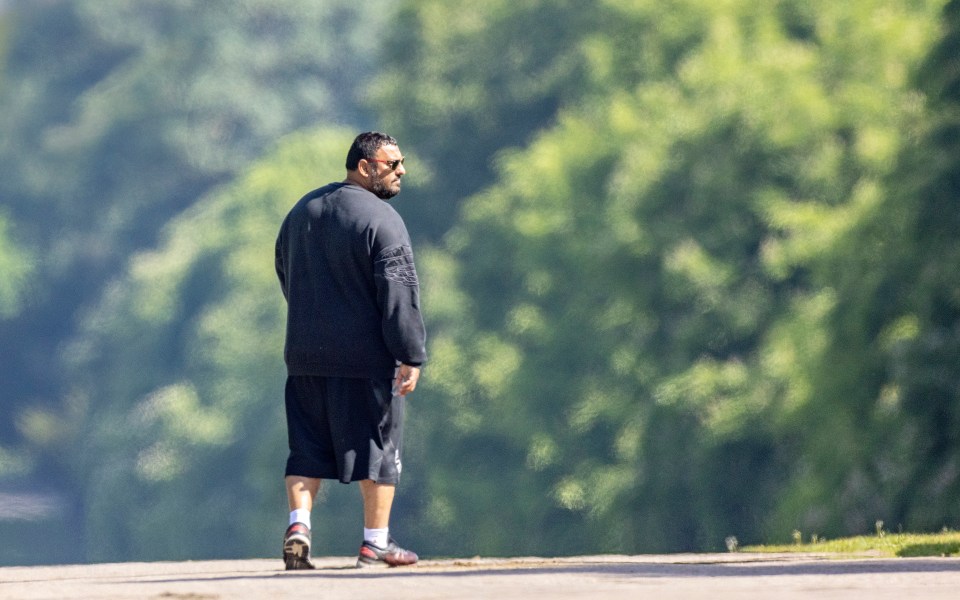 The former World Featherweight Boxing champ was out walking his dog on the Queen’s Long Walk