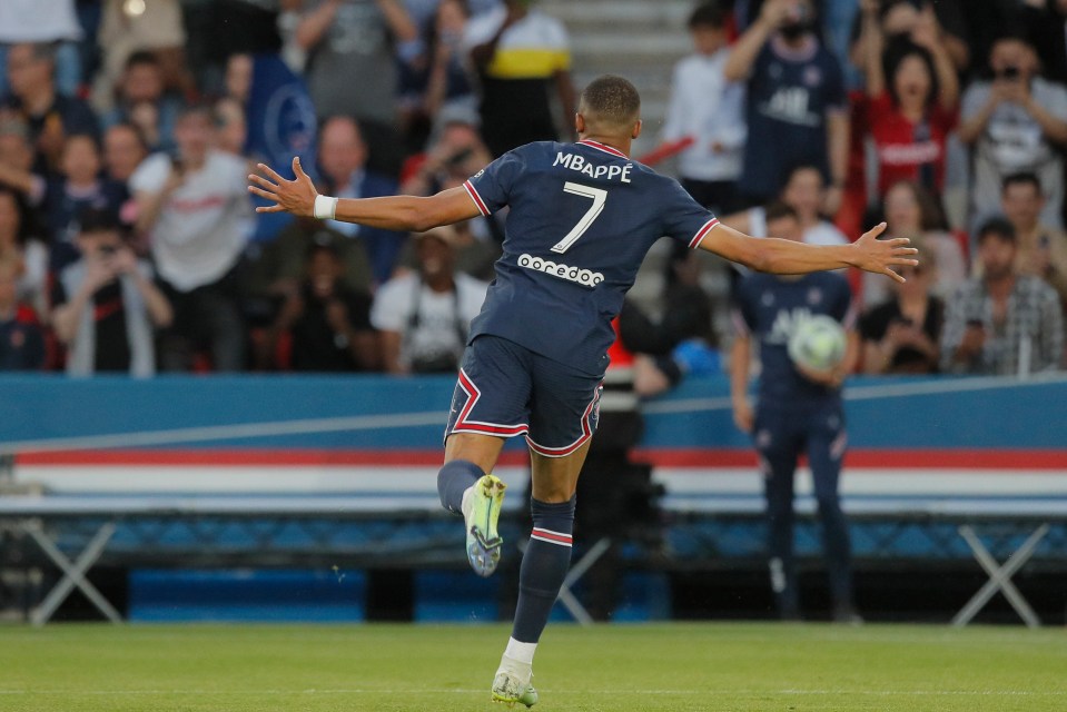 Kylian Mbappe celebrates after scoring against Metz for PSG