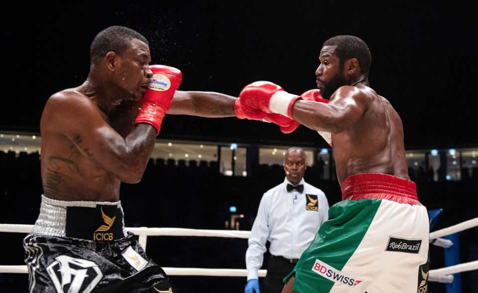 Don Moore and Floyd Mayweather during their exhibition