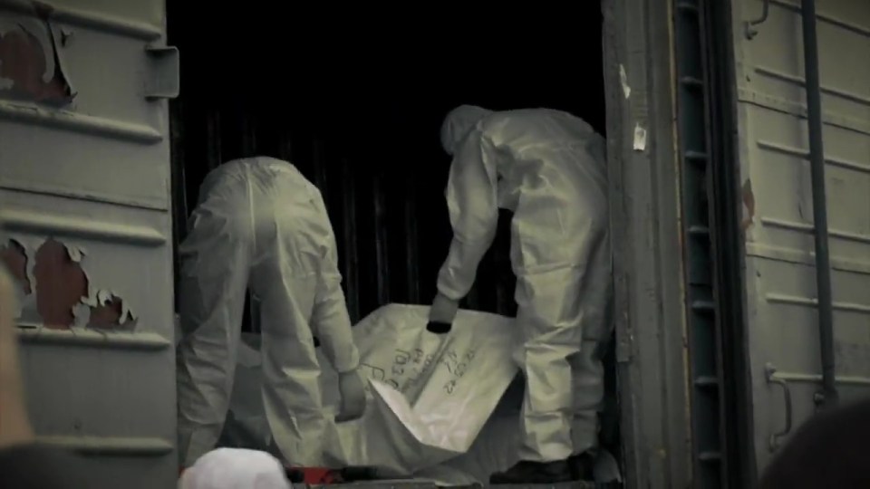 The video shows bodies being stored in refrigerated trains