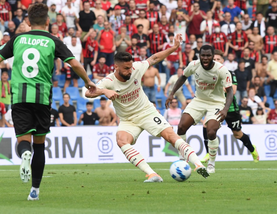 Veteran hitman Olivier Giroud drills Milan's opener in his first-half double