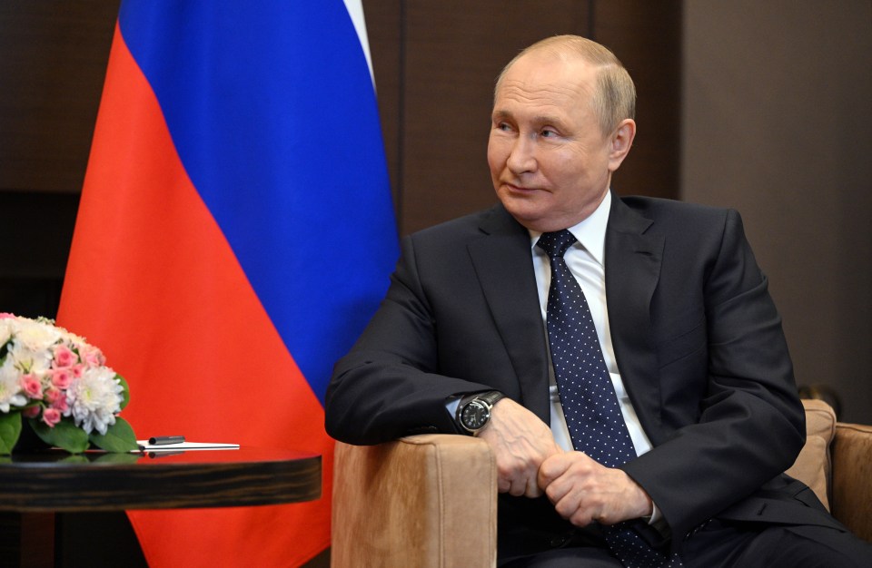 Vladimir Putin during the meeting with his now familiar bloated face