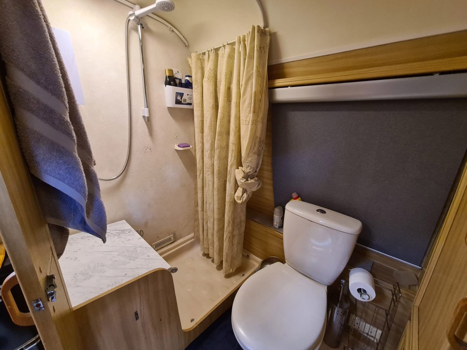 At the other side of the caravan is a very compact bathroom