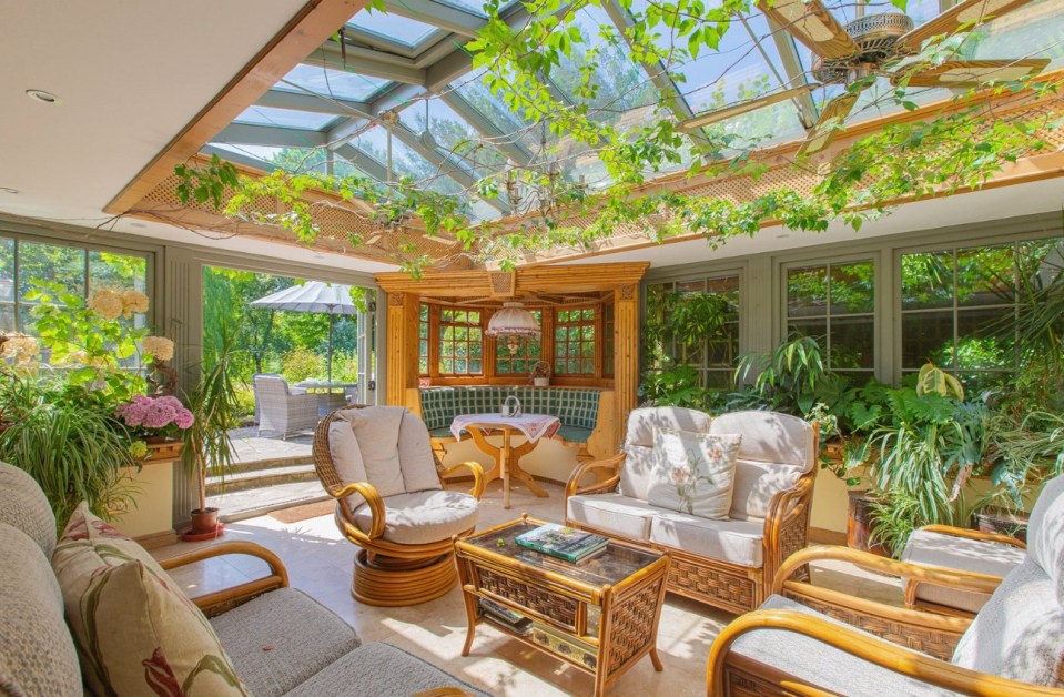 The conservatory is bright and airy, attracting a lot of light