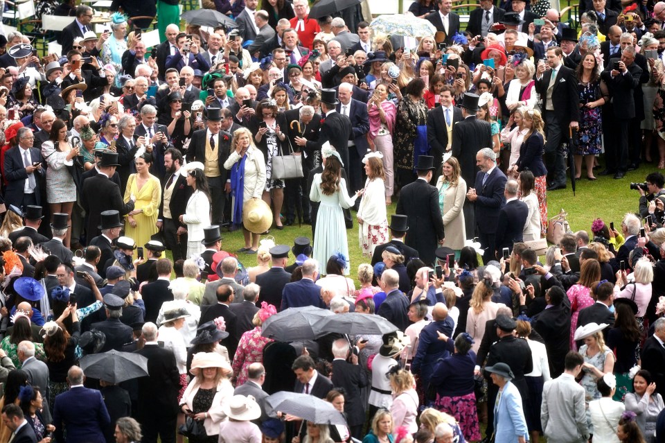 Large crowds of guests met the royals at Buckingham Palace this afternoon