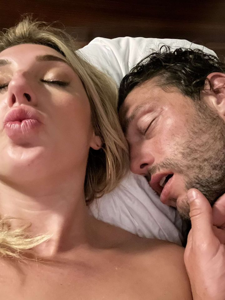 The football ace was pictured on a bed together with a blonde beauty