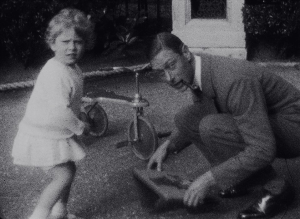 The then Princess Elizabeth with her father in their London garden in 1930