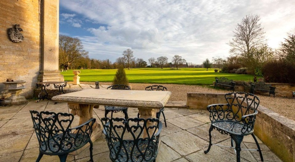 The outdoor seating provides a beautiful view of the 37 acre estate, which features two lakes, an orchard, and a woodland