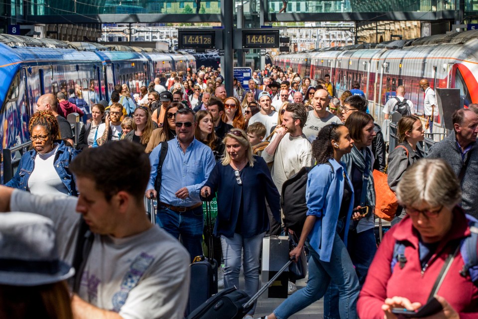 Passengers at King's Cross station in London poured out of trains