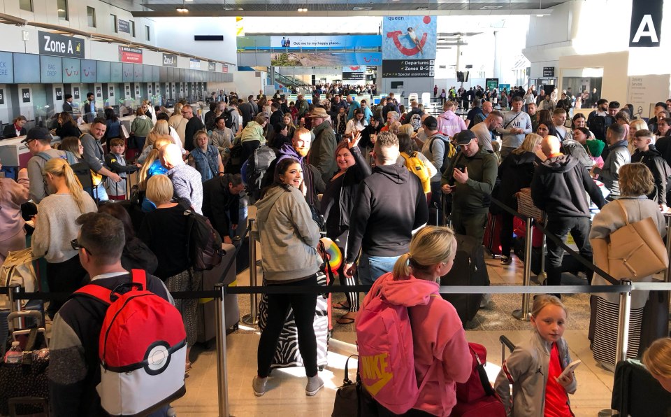 Huge queues packed into Manchester Airport this morning