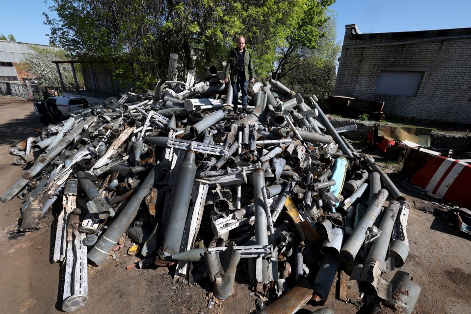 This 15ft-high pile of rockets, missiles and bombs was collected from homes and gardens, dug out of the streets and children’s playgrounds