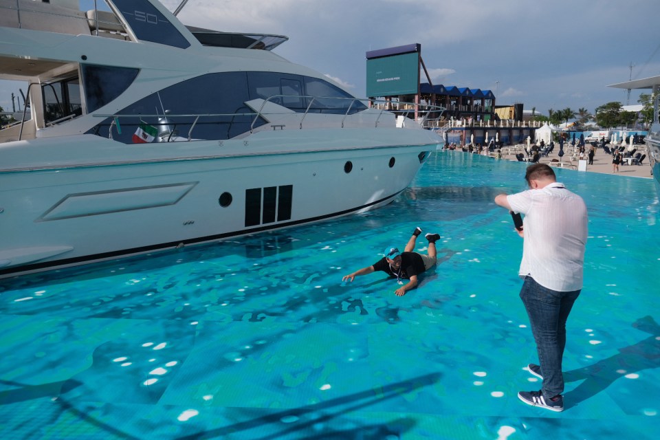 Some at the track pretended to swim next to the boats