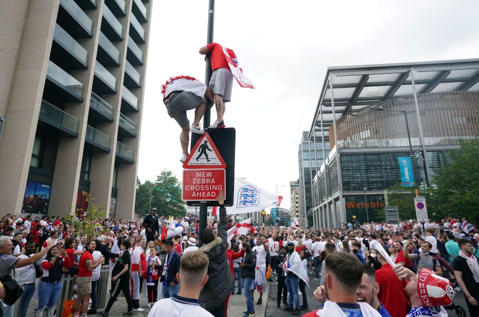 England fans also climbed lamp posts