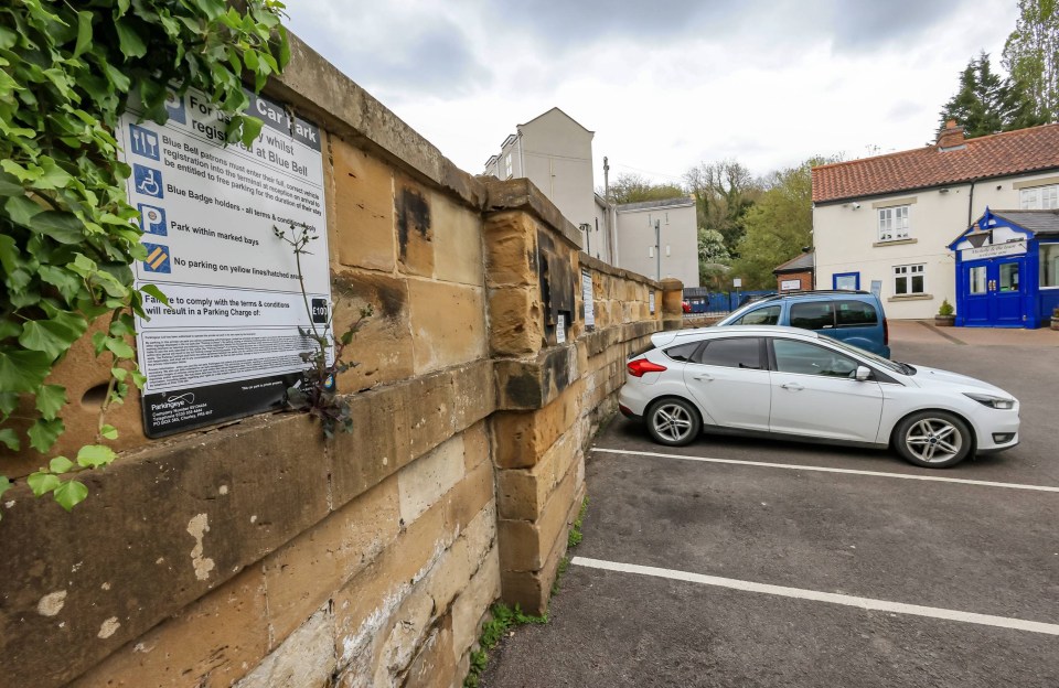 The pub carpark is awash with warning signs to avoid the large fines