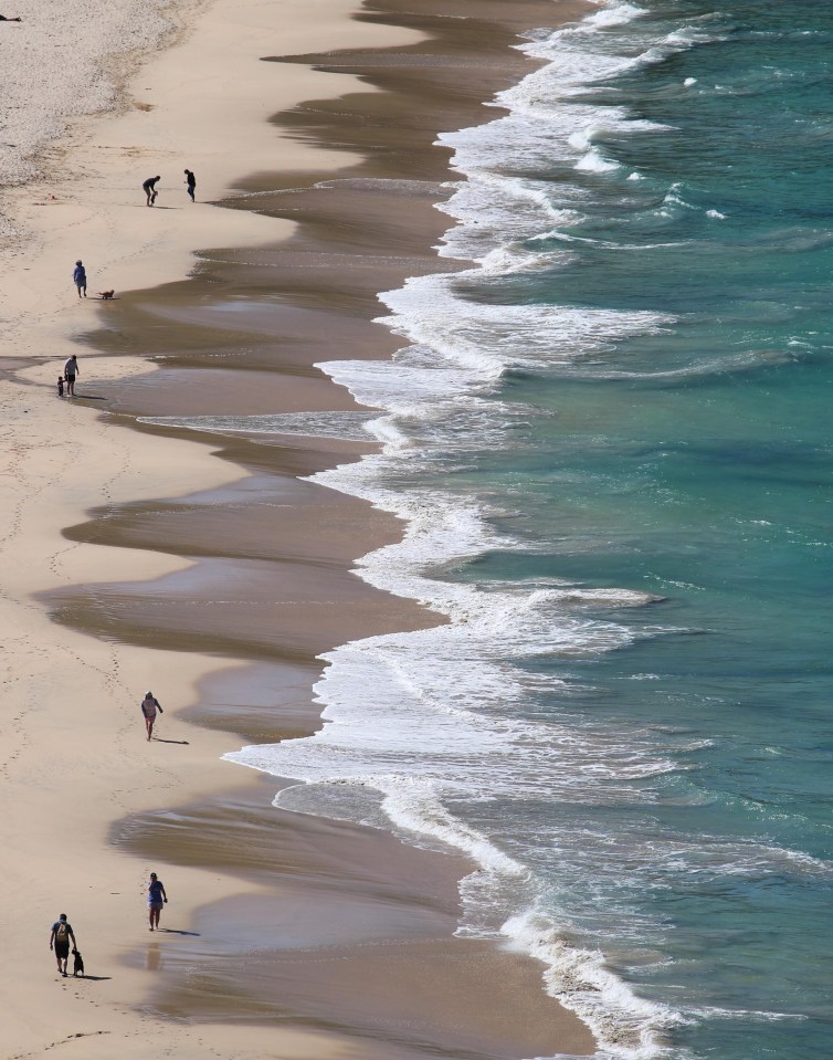 Sunseekers return to the beaches at St Ives and Carbis Bay in West Cornwall