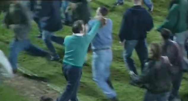 Brian Clough punches his own fans for celebrating a win over QPR on the pitch