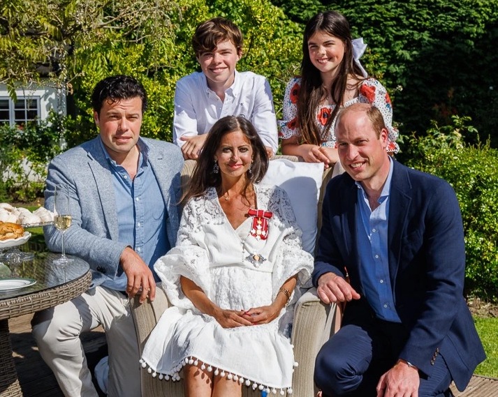 Deborah James receives her Damehood from Prince William - pictured with her husband and kids