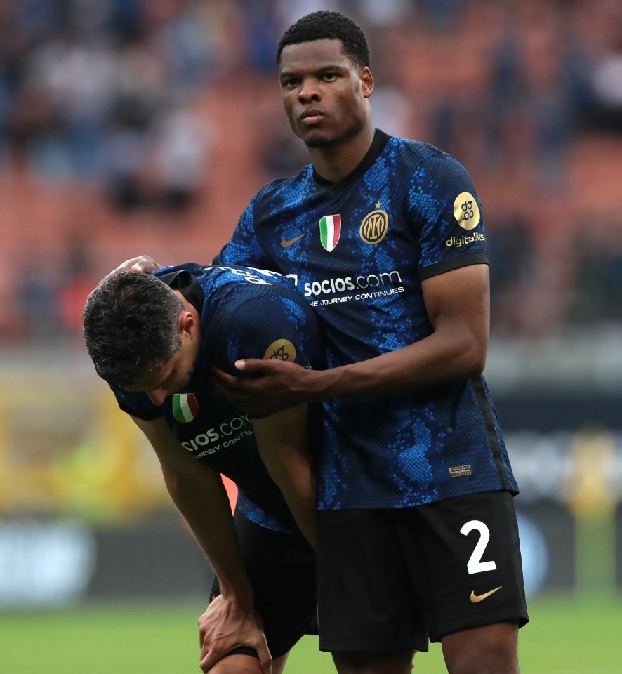 Denzel Dumfries consoled his Inter team-mates after they lost out in the title race on the last day despite beating Sampdoria 3-0