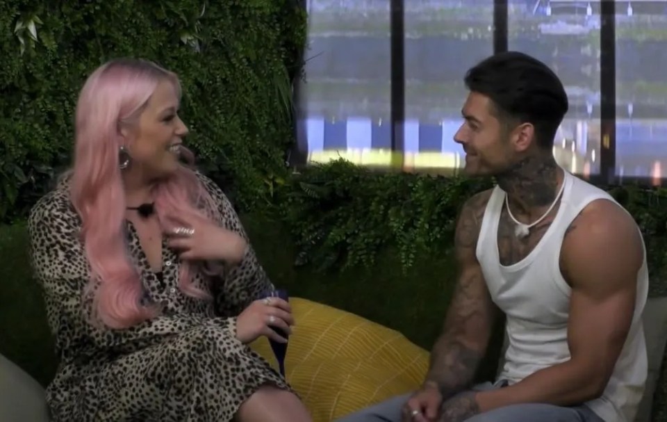 Robbie claims producers forced him to chat to Amelia Lily (left) and sent them on a date