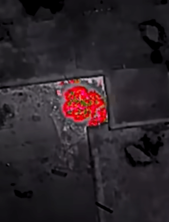 Explosions are seen in the thermal camera mounted on the Ukrainian drone